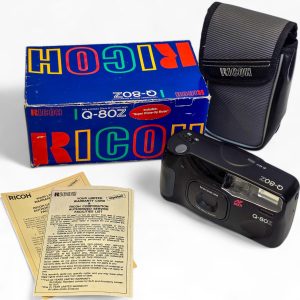 📸 Ricoh Q-80Z 35mm Power Zoom – Completa com Caixa – Como Nova